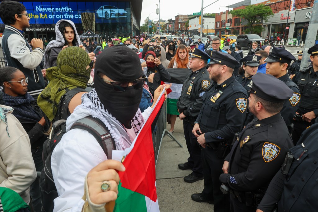 Anti-Israel protesters outside of Barclays Center in Brooklyn during at CUNY graduation ceremony on May 23, 2025.
