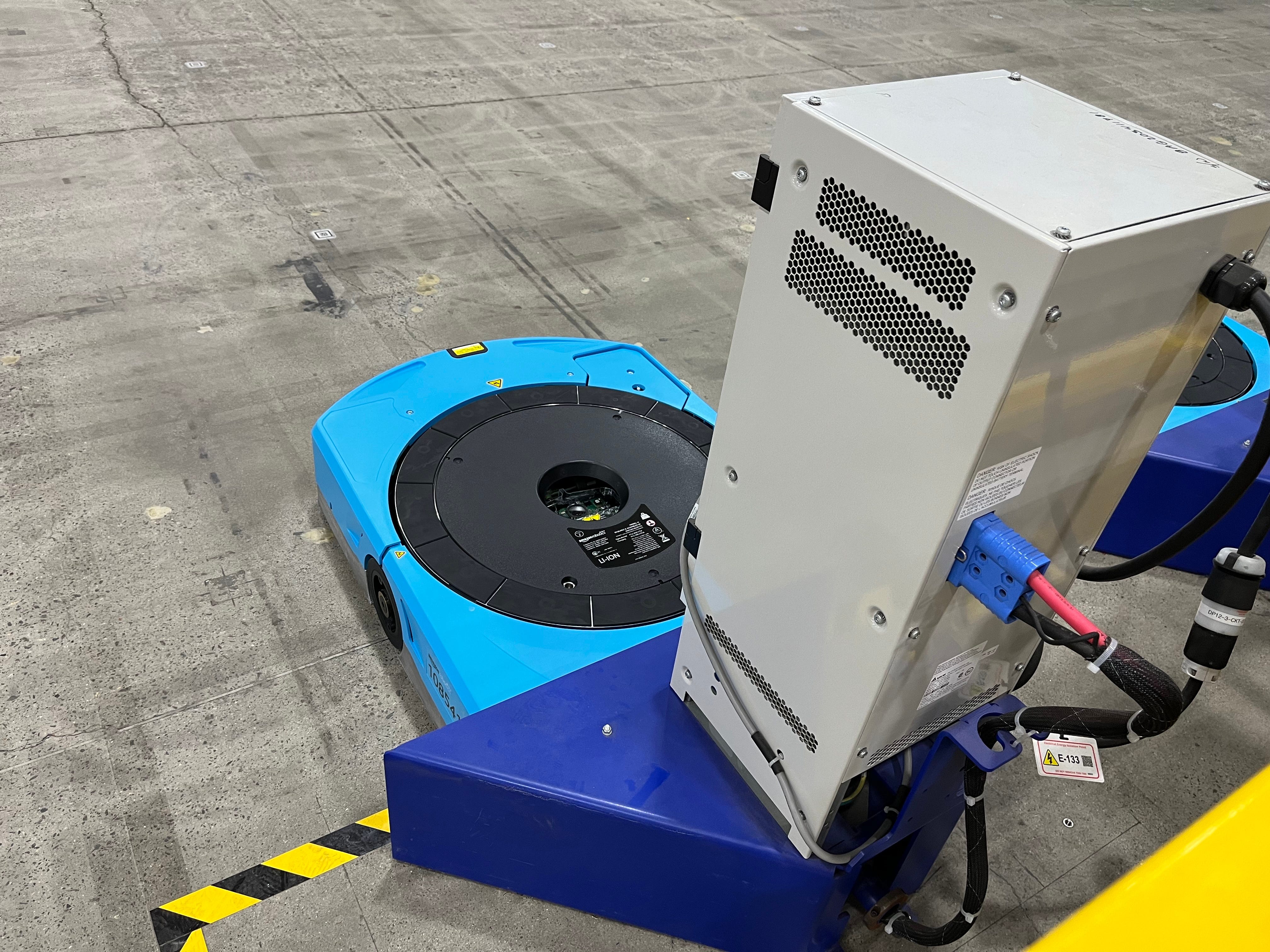 Blue Amazon robot has its battery charged