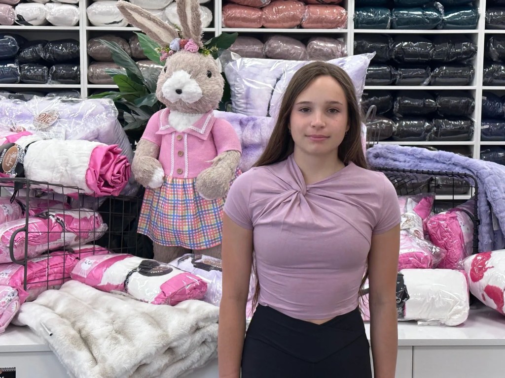 Alisa Petrov in store smiling