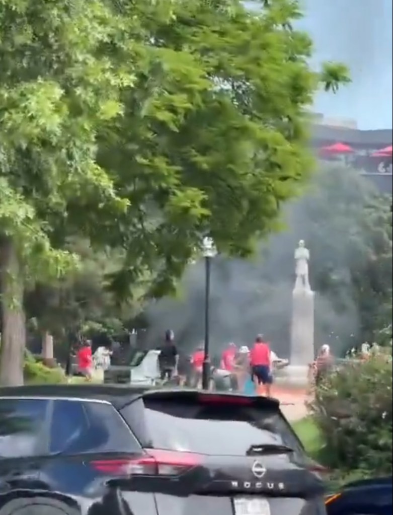 Smoke seen during a rally at the Pearl Street mall in Boulder Co.
