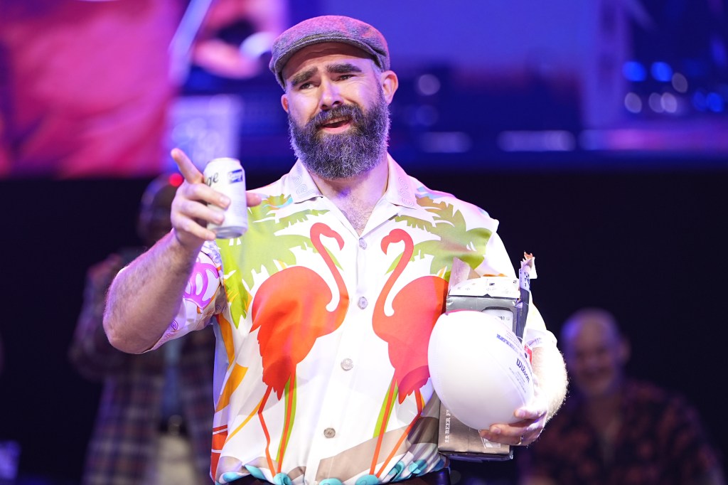Jason Kelce wearing a flamingo shirt at a charity event
