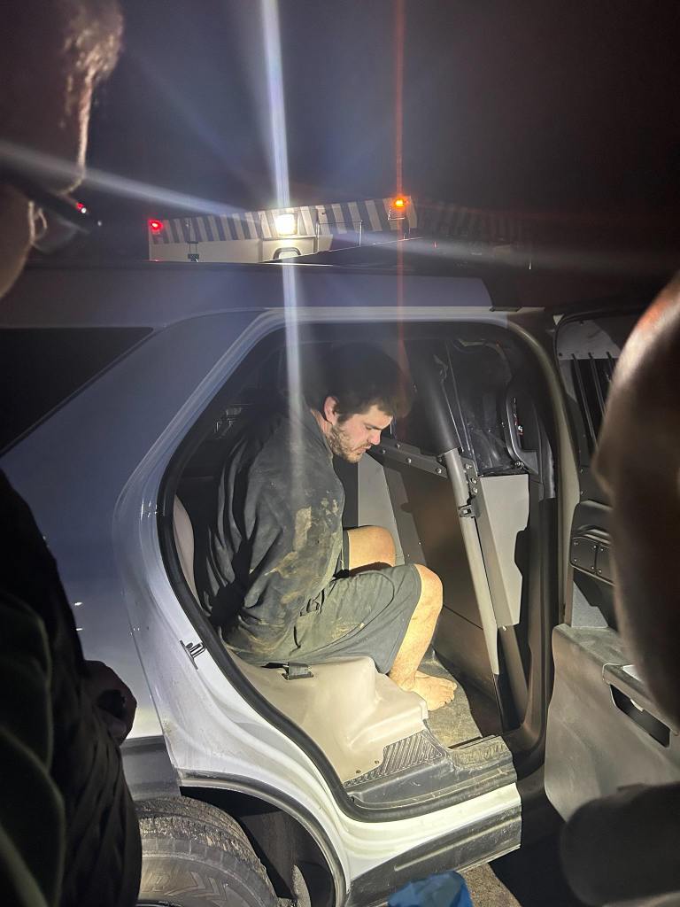 McEuen was barefoot and covered in mud when he was taken into custody, police photos show.