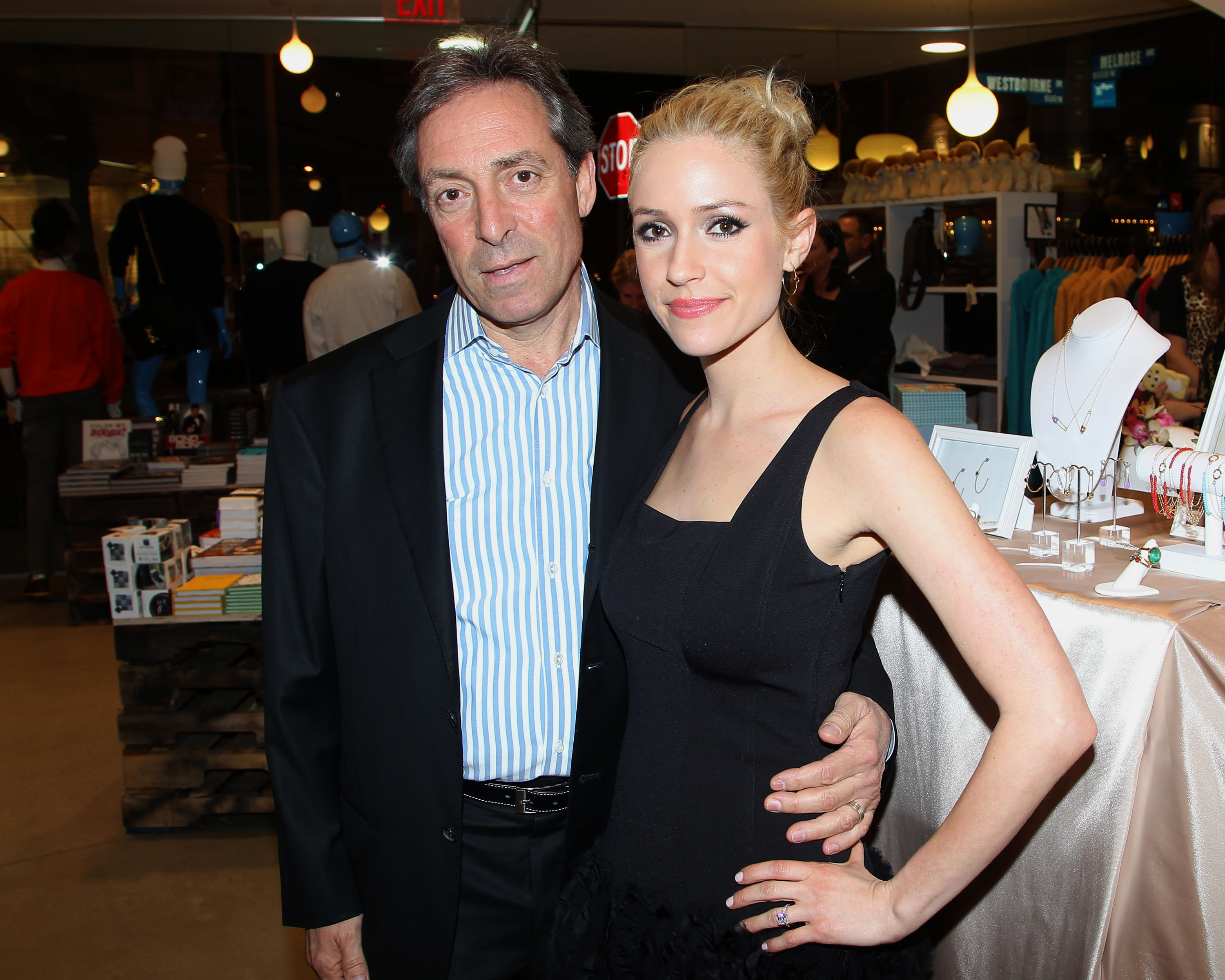 Kristin Cavallari and Dennis Cavallari pose at an event. 