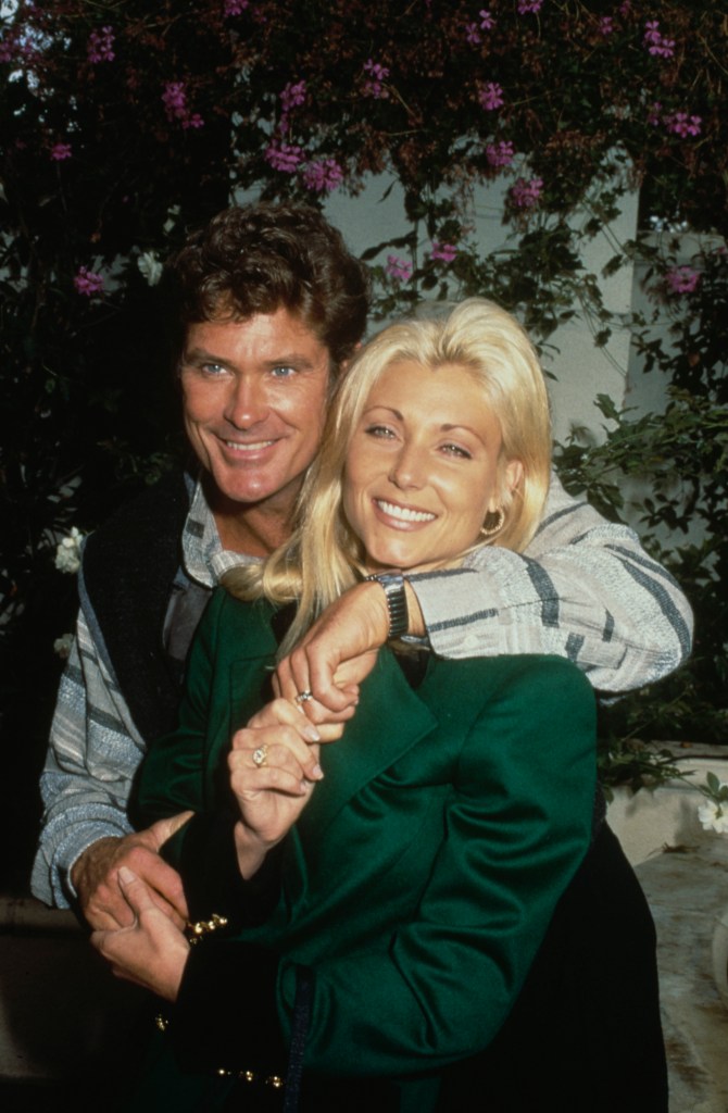 Pamela Bach and ex David Hasselhoff holding hands.