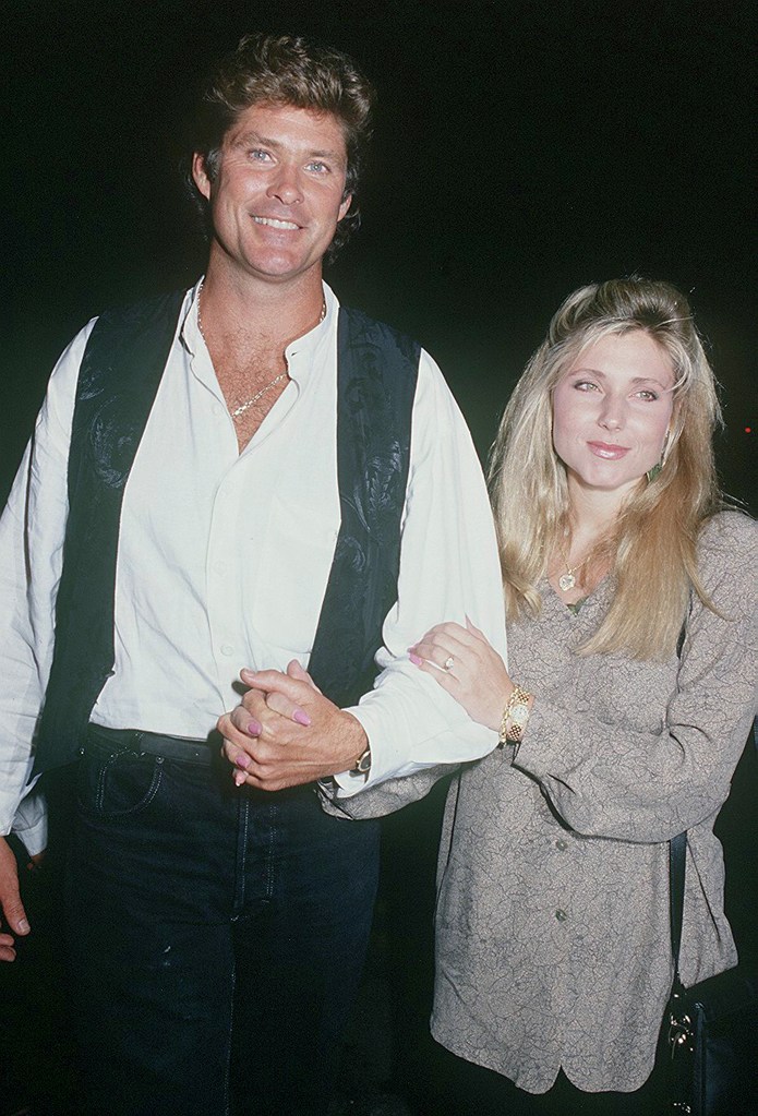 Pamela Bach and ex David Hasselhoff holding hands.