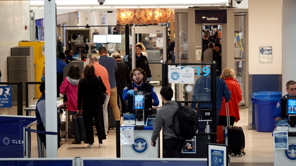 Passengers at Newark Airport security checkpoint.