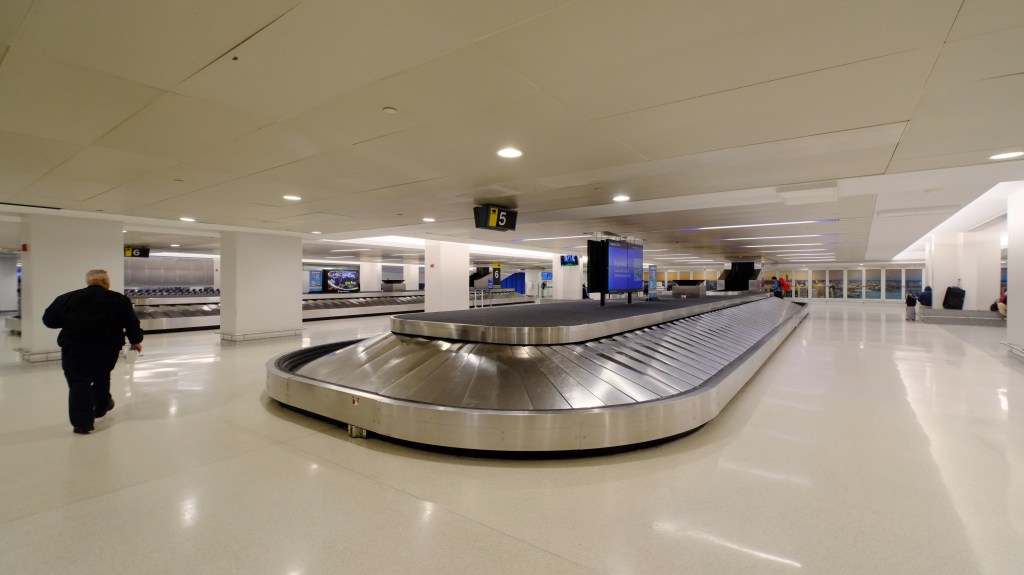 Baggage claim area in United Airlines Terminal C at Newark Airport.