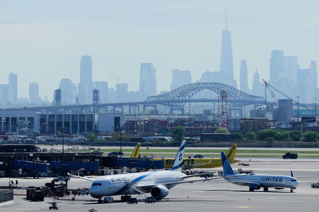 Newark Liberty International Airport with New York City skyline in the background.