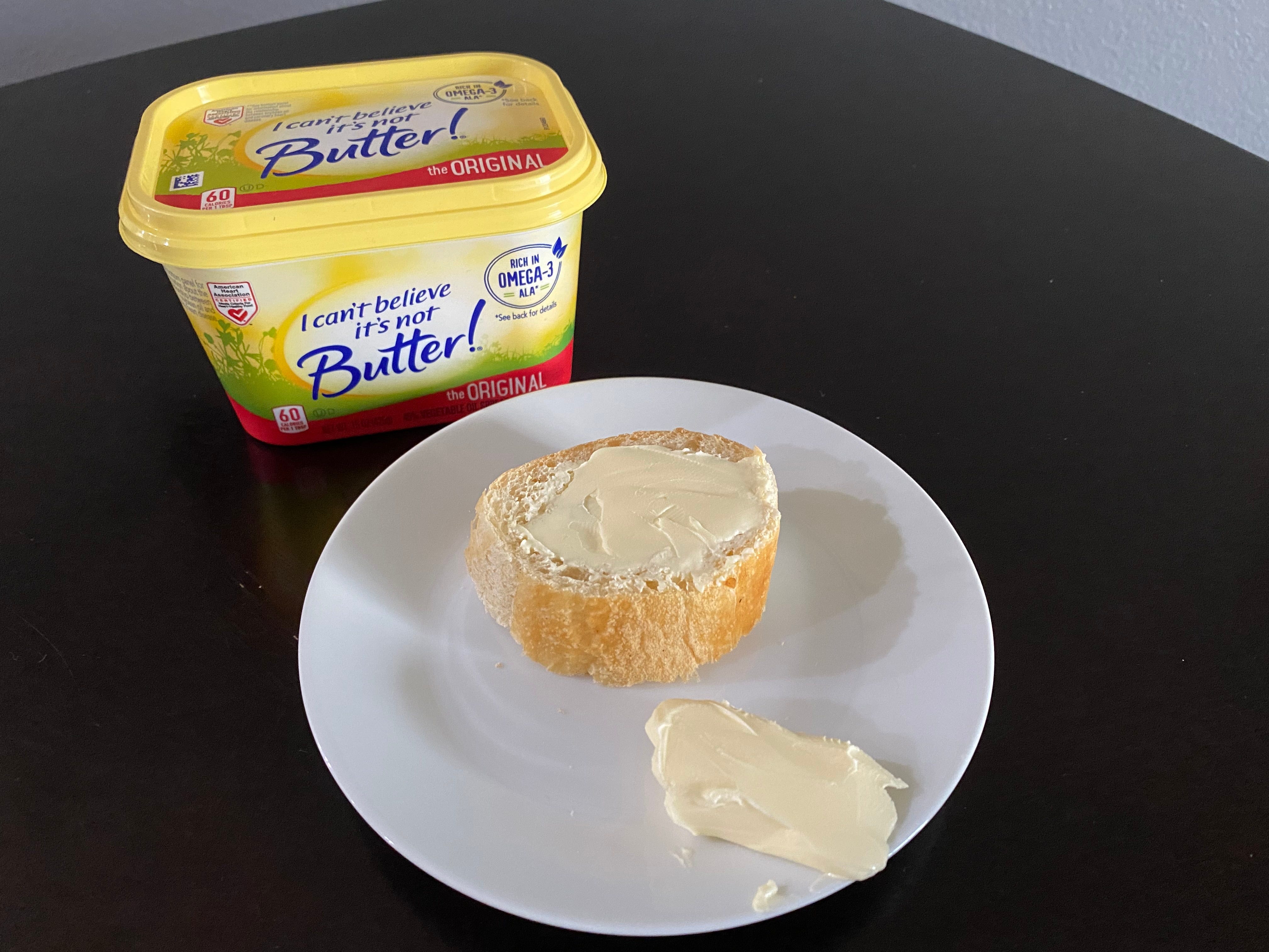 i cant believe it's not butter spread on a piece of bread
