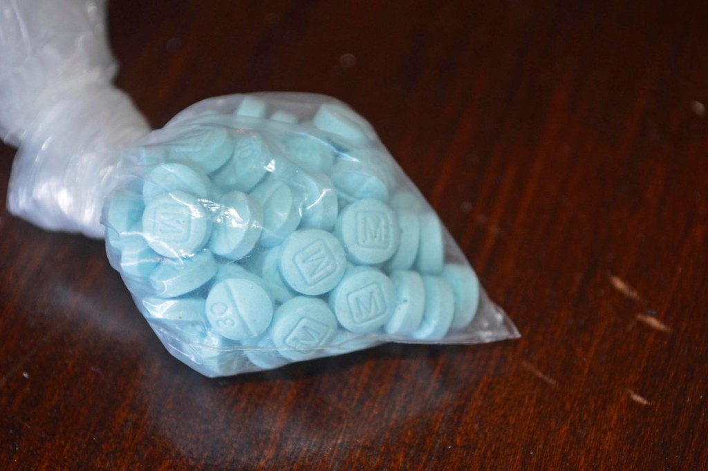 Bag of light blue fentanyl pills.