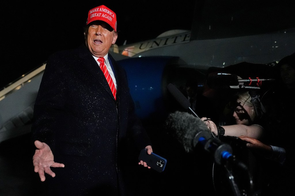 Donald Trump speaking to reporters.