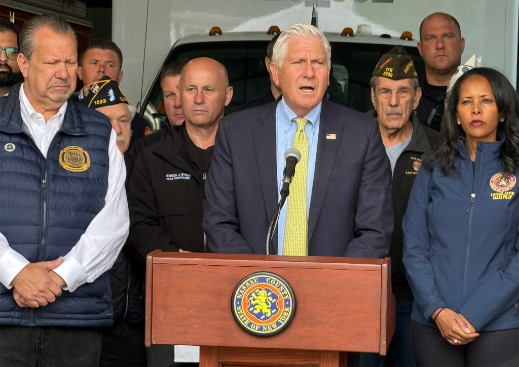Nassau County Executive Bruce Blakeman, Valley Stream Mayor Edwin Fare, and Nassau Legislator Mazi Pilip announce a moment of silence for Memorial Day.
