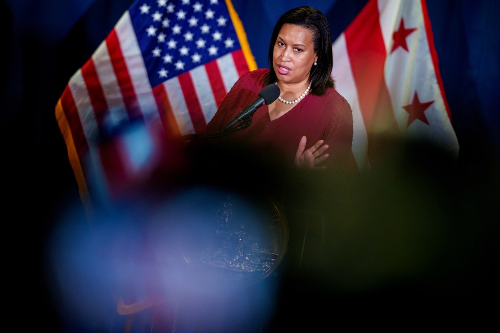 Mayor Muriel Bowser speaking at a podium.