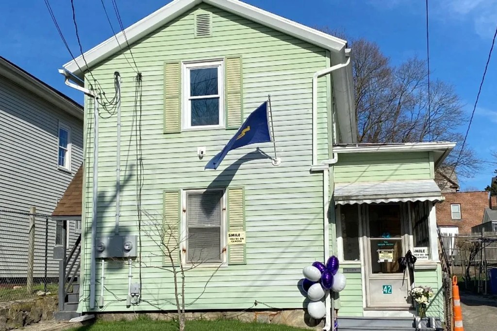 House with memorial for Connecticut woman killed by stray bullet.