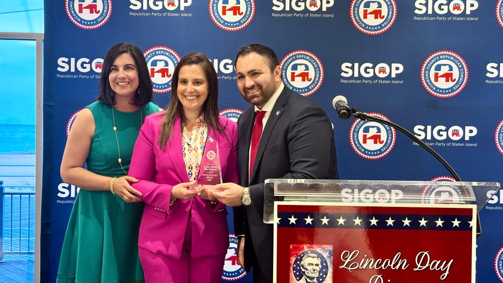 Rep. Elise Stefanik posing with Rep. Nicole Malliotakis and Staten Island Republican Party Chairman Michael Tannousis at the borough's Lincoln Dinner on June 2, 2025.