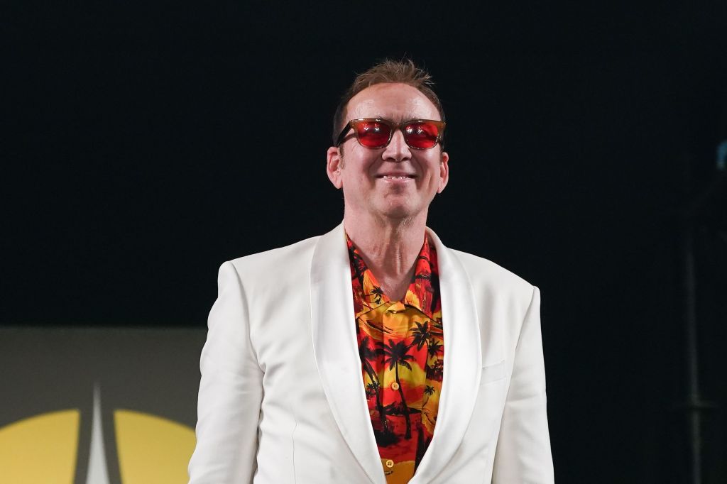 Nicolas Cage poses for a photo.