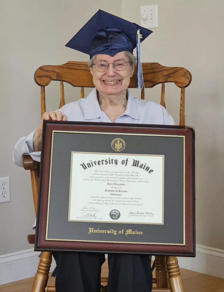 She was all smiles with her diploma. 