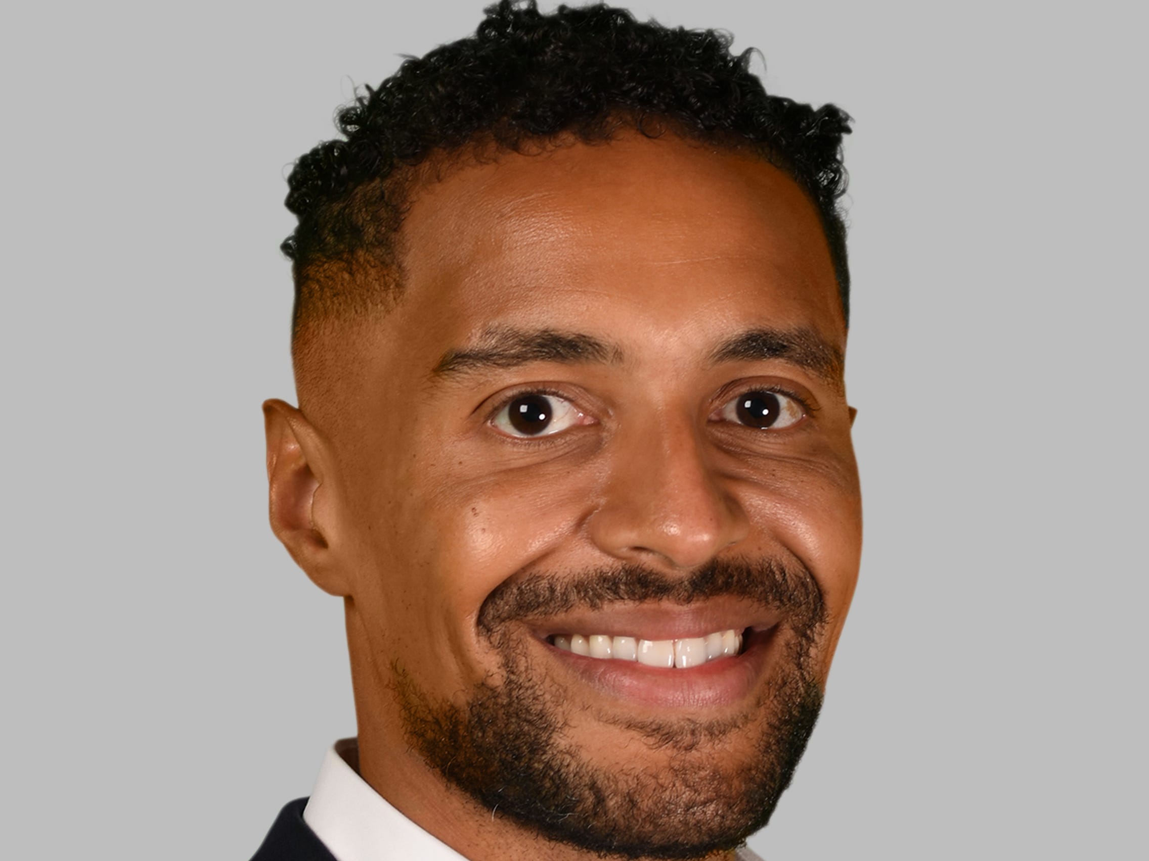 Edward Keith, Head of Infrastructure Secondaries, Ares in a suit