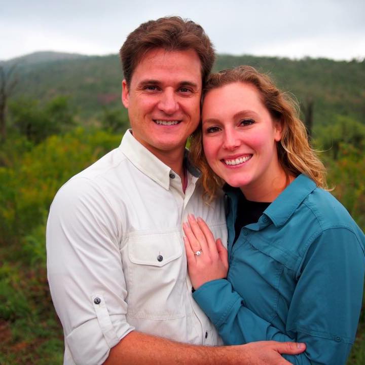 Photo of a couple embracing outdoors.