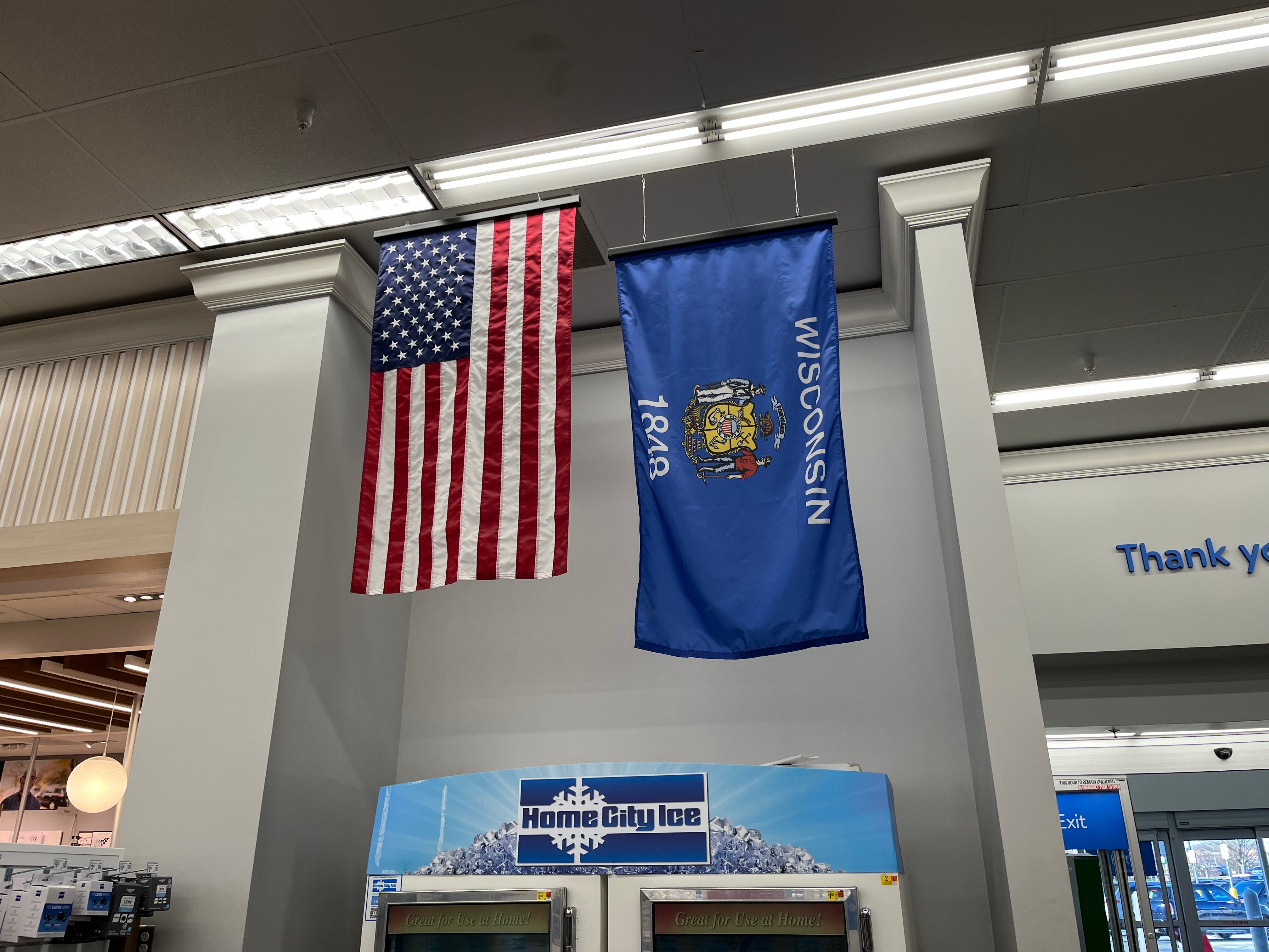 American and Wisconsin flags at Walmart in Wisconsin.