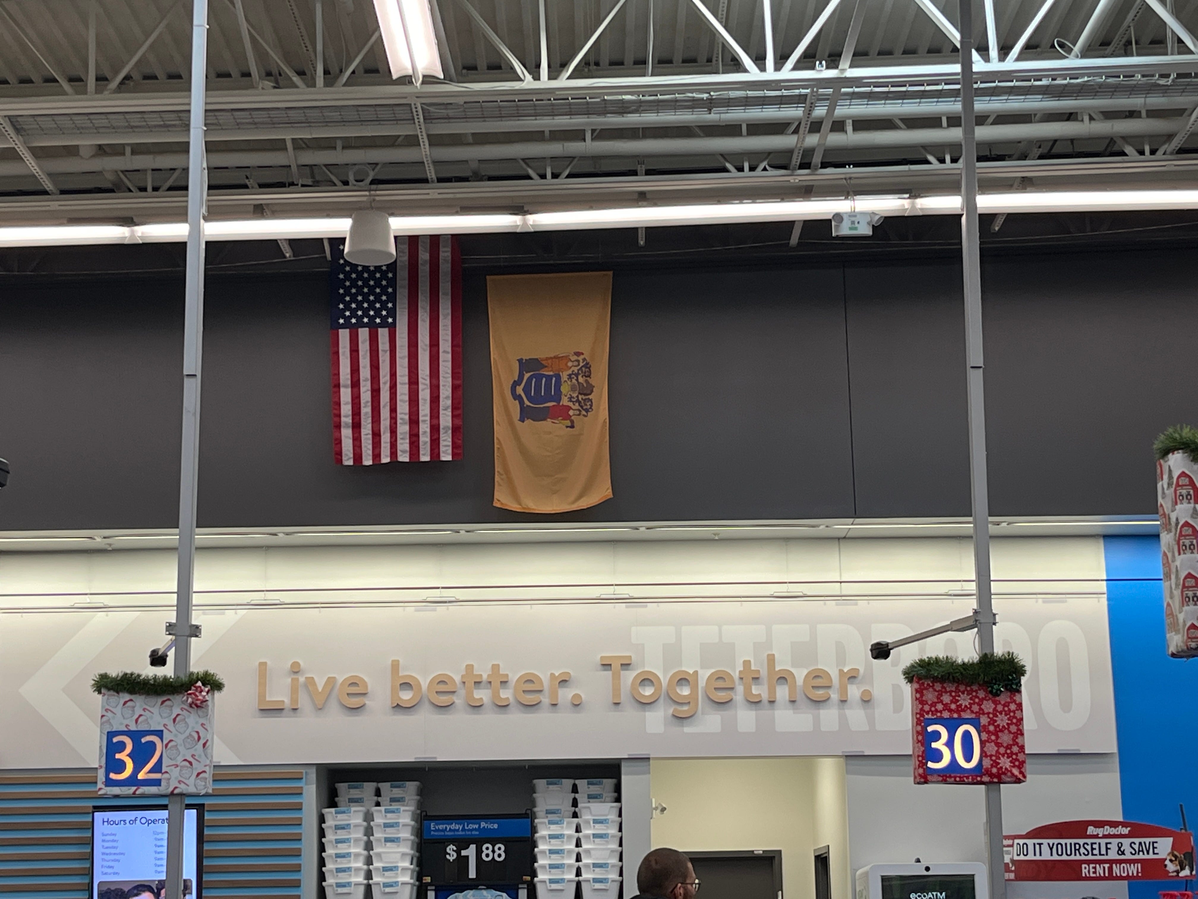 American and New York state flags at Walmart.