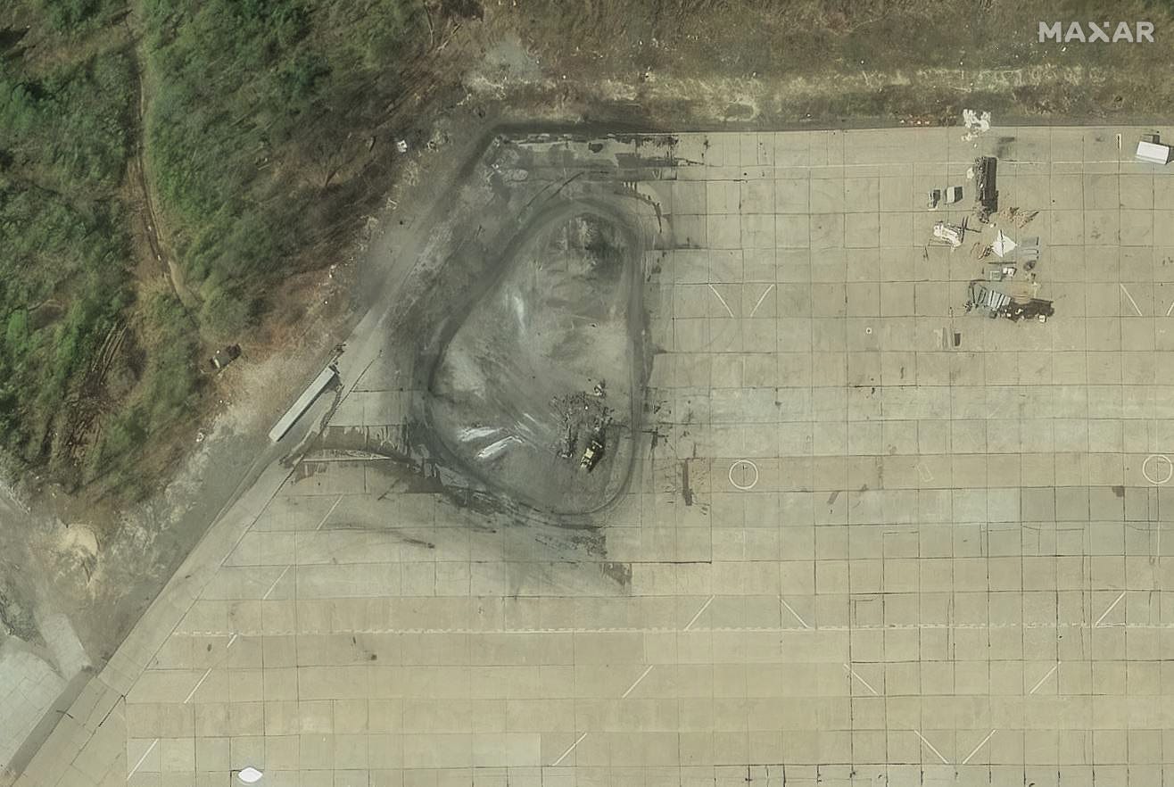 This satellite image shows debris at the Olenya airbase on June 4.