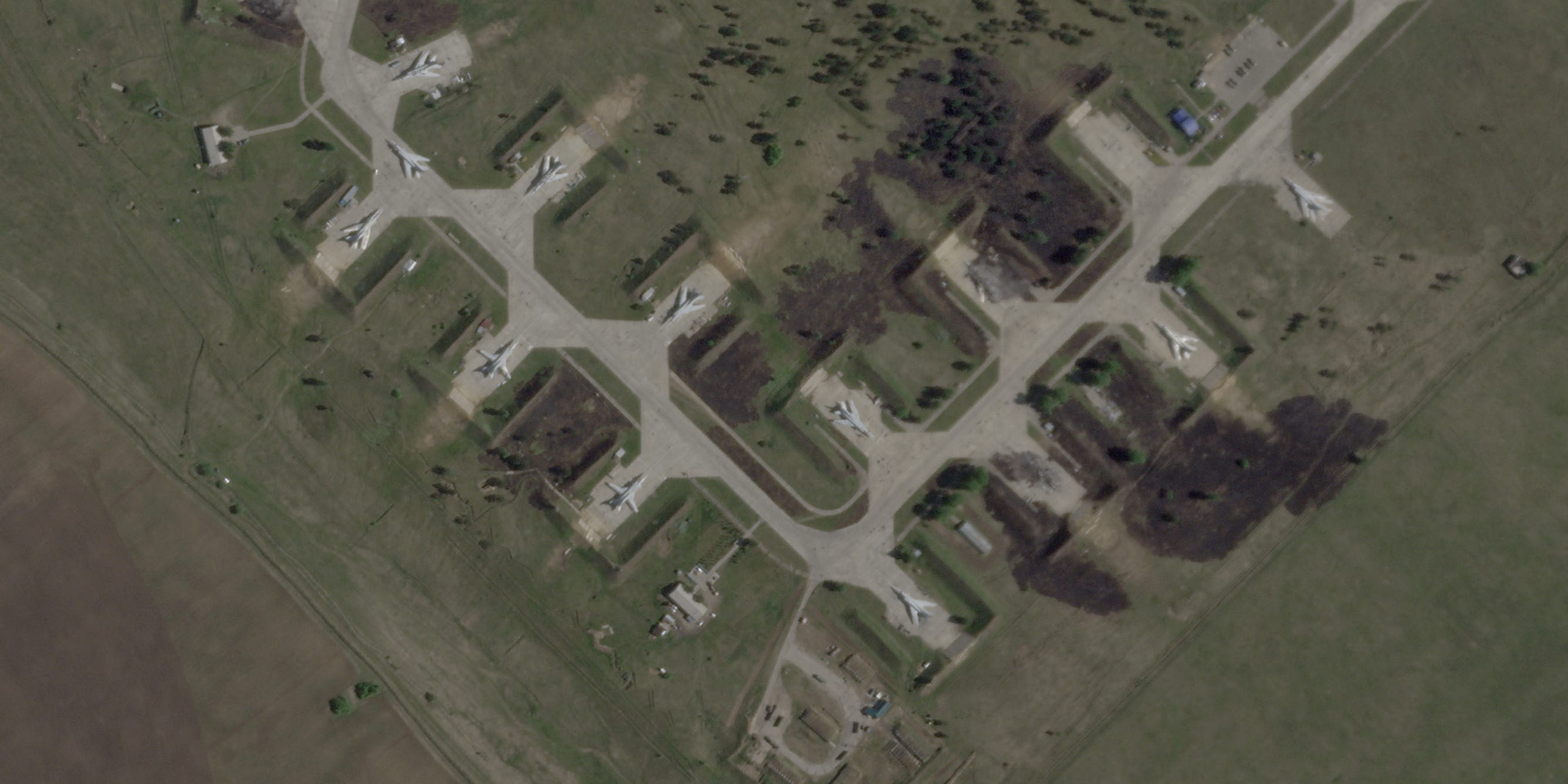 A satellite view shows military aircraft, some sitting destroyed, at the Belaya air base, near Stepnoy, Irkutsk region, Russia, June 4, 2025.