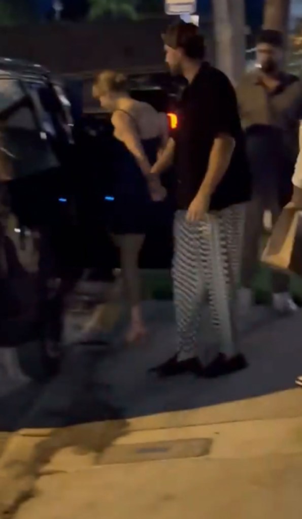 Taylor Swift and Travis Kelce hold hands leaving dinner date at Palm Beach restaurant 