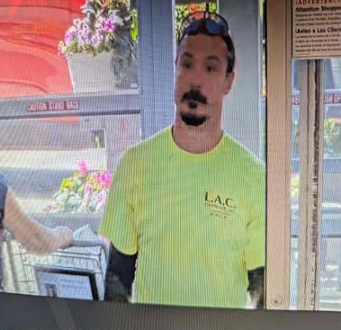 Surveillance image of Travis Decker.