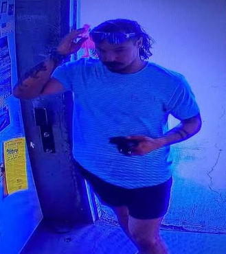 Surveillance image of Travis Decker.