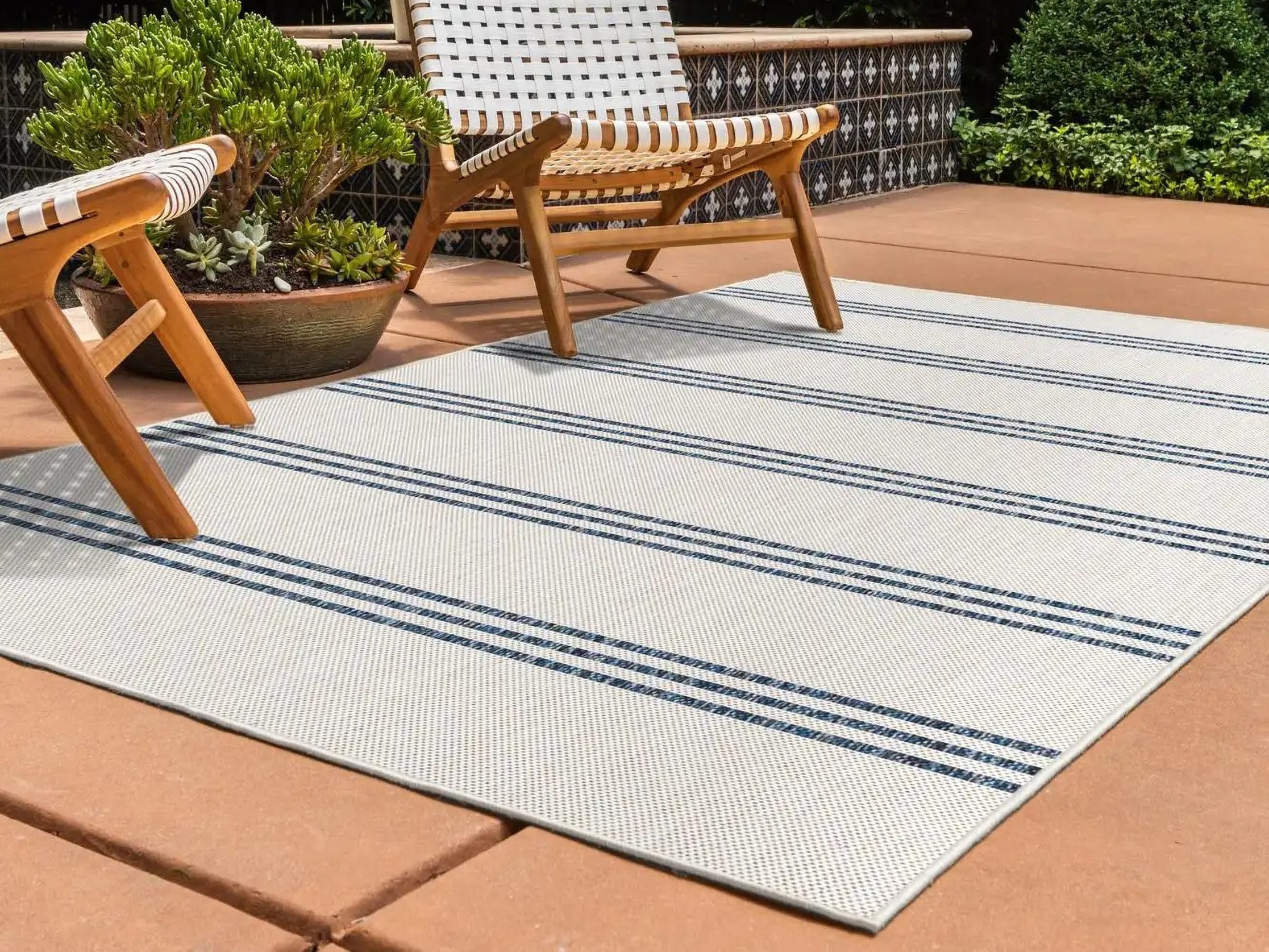Chairs and rug on a deck