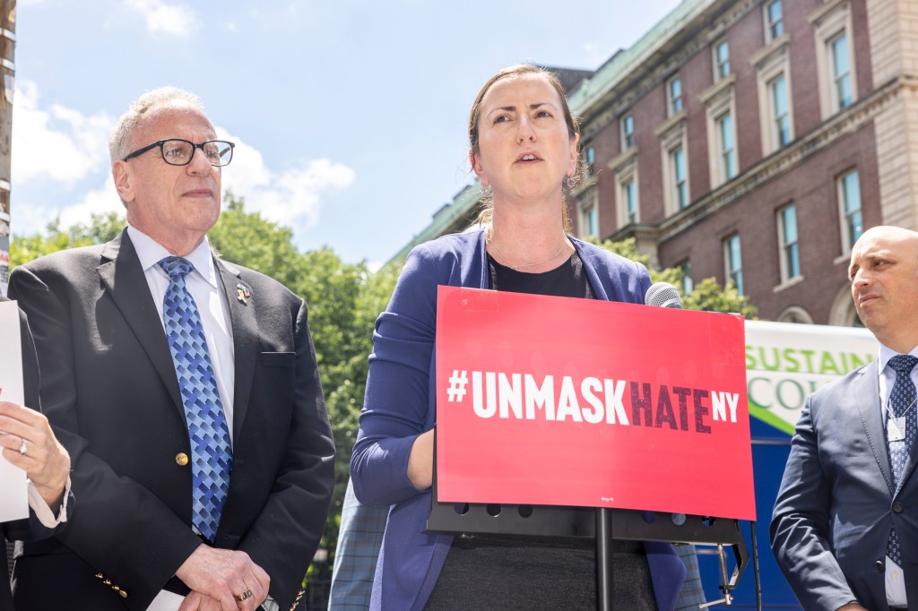 Queens Assembly member Nily Rozic at a press conference advocating for a mask mandate in New York.