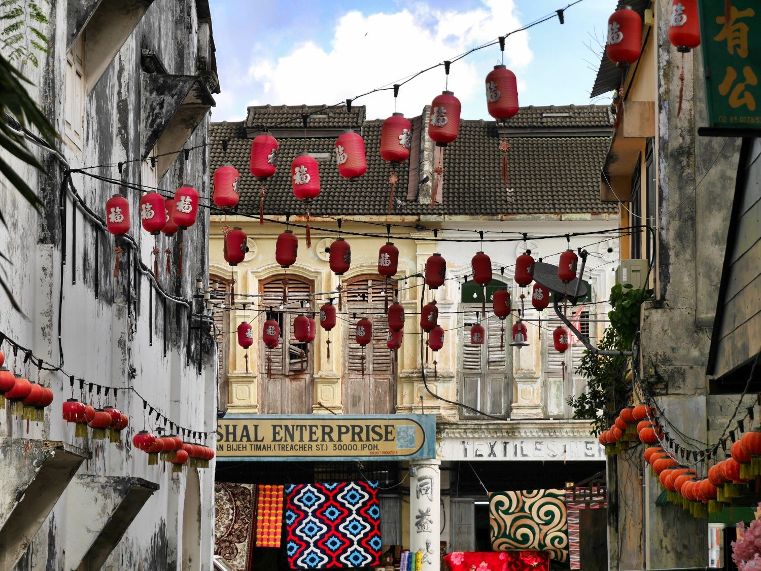 A street in Ipoh, Malaysia red lanterns hanging.