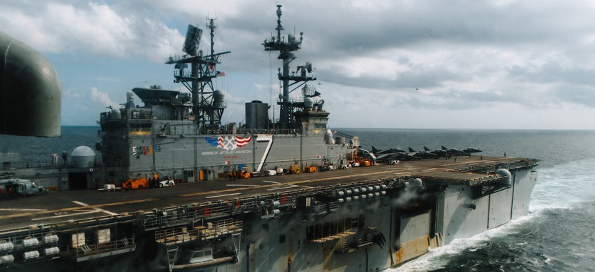 The Wasp-class amphibious assault ship USS Iwo Jima sails in the Atlantic Ocean during a simulated strait transit on May 27, 2025. 
