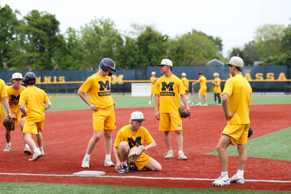 Massapequa baseball players take a break during a practice in May.