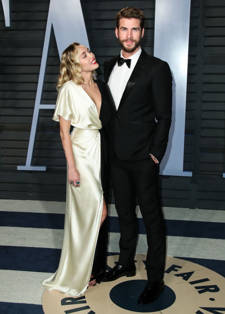 Miley Cyrus and Liam Hemsworth at March 2018 Oscar party