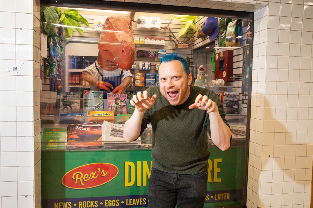 Akiva Leffert in front of Rex's Dino Store.