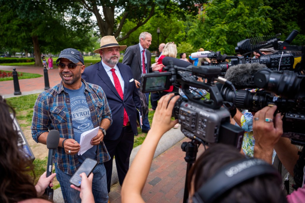 Enrique Tarrio, former leader of the Proud Boys, speaks to reporters near the White House.