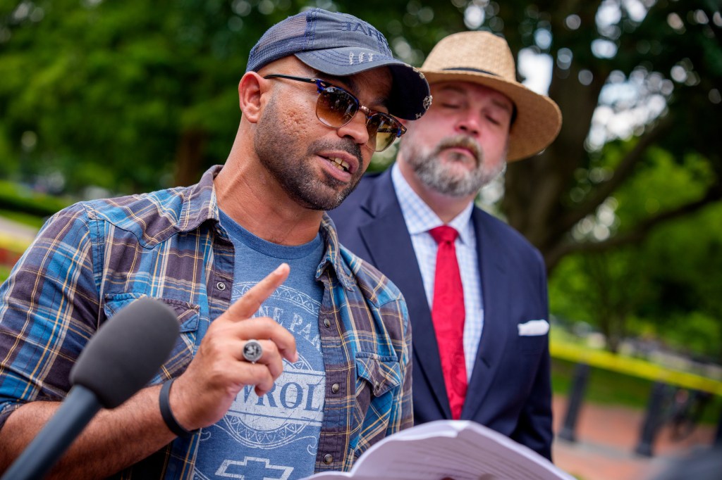 Enrique Tarrio, former leader of the Proud Boys, speaks at a news conference near the White House.
