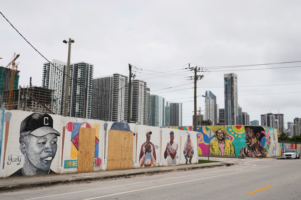 Defaced mural of Jackie Robinson and other baseball legends in Miami.