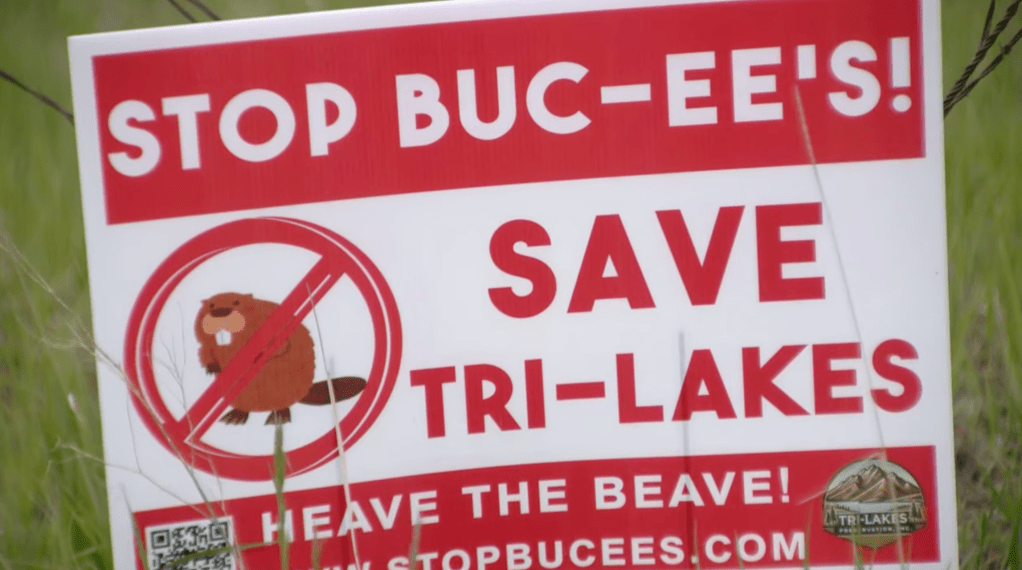 A placard raising concerns of the Buc-ees location that could cause problems to the local environment.