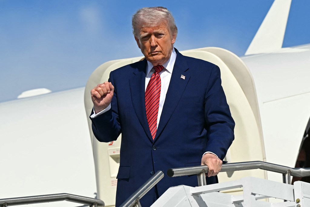 President Donald Trump disembarking Air Force One.