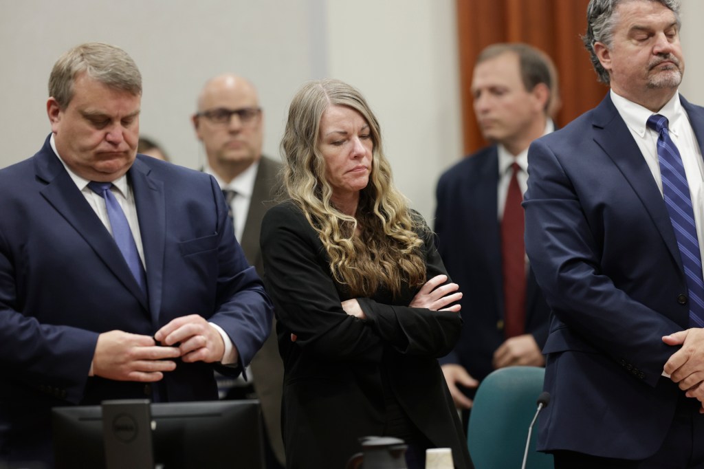Lori Vallow Daybell stands in an Idaho court as the jury reads a guilty verdict on May 12, 2023.