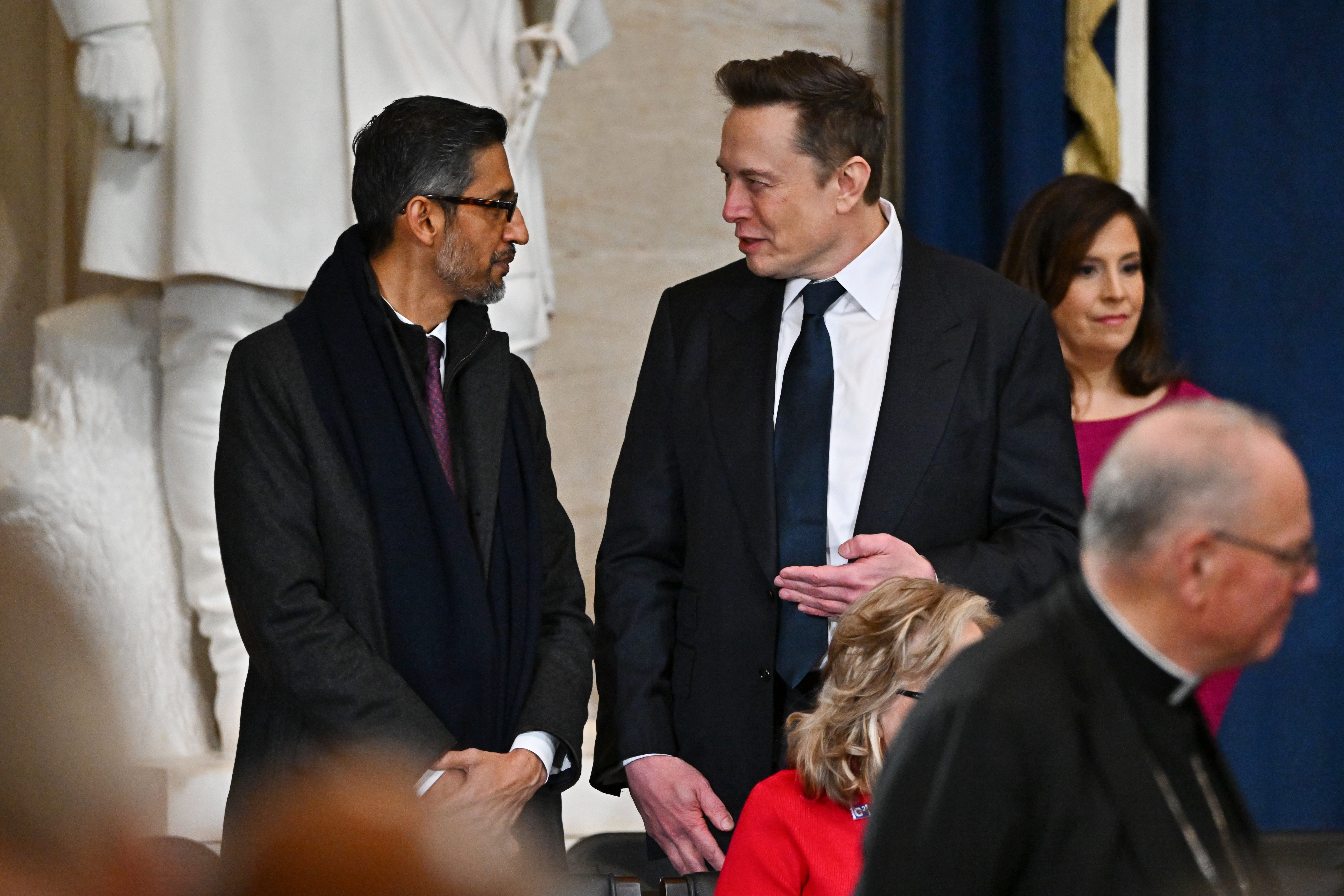 Sundar Pichai next to Elon Musk