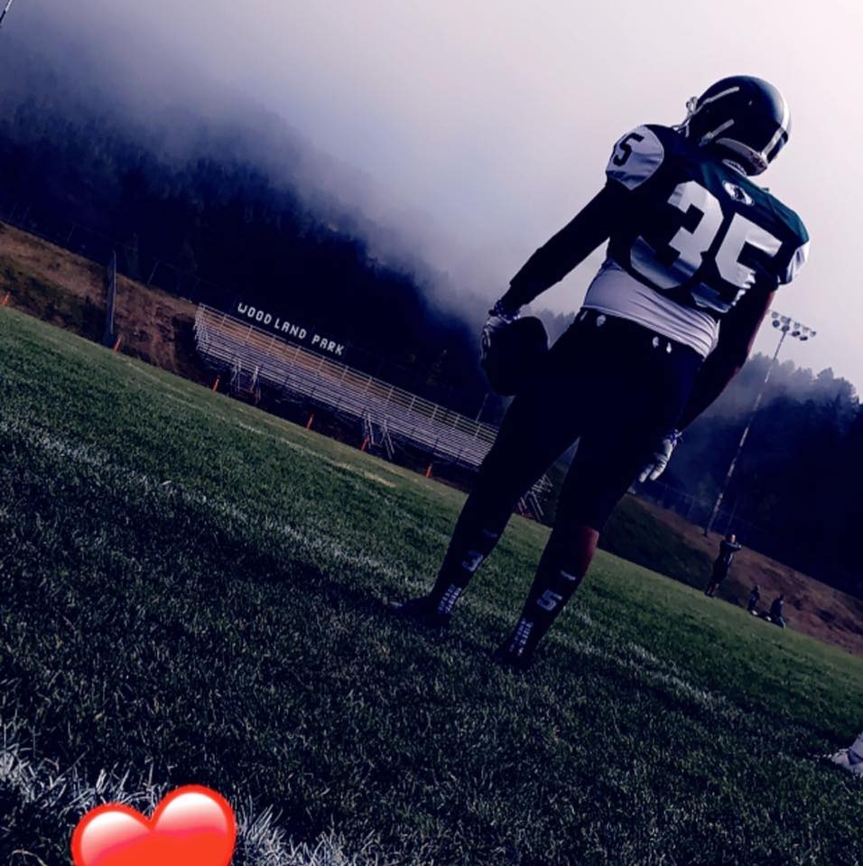 Photo of Aiden Hernandez, a football player, on a field.