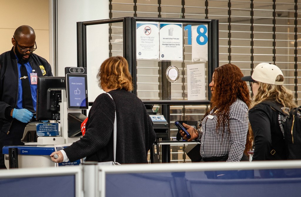 Passengers at a TSA checkpoint.