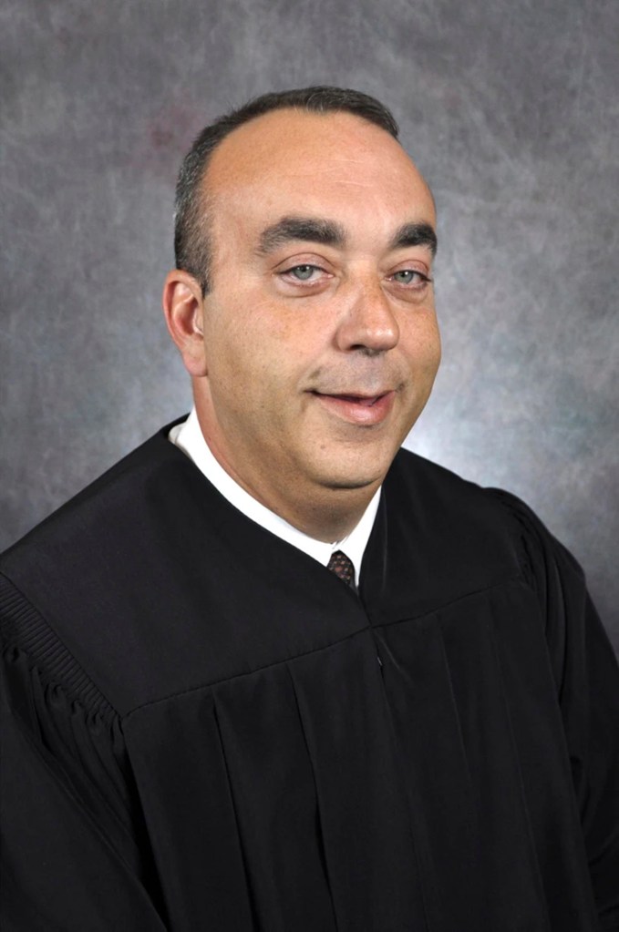 Portrait of District Judge Kevin Mullins.