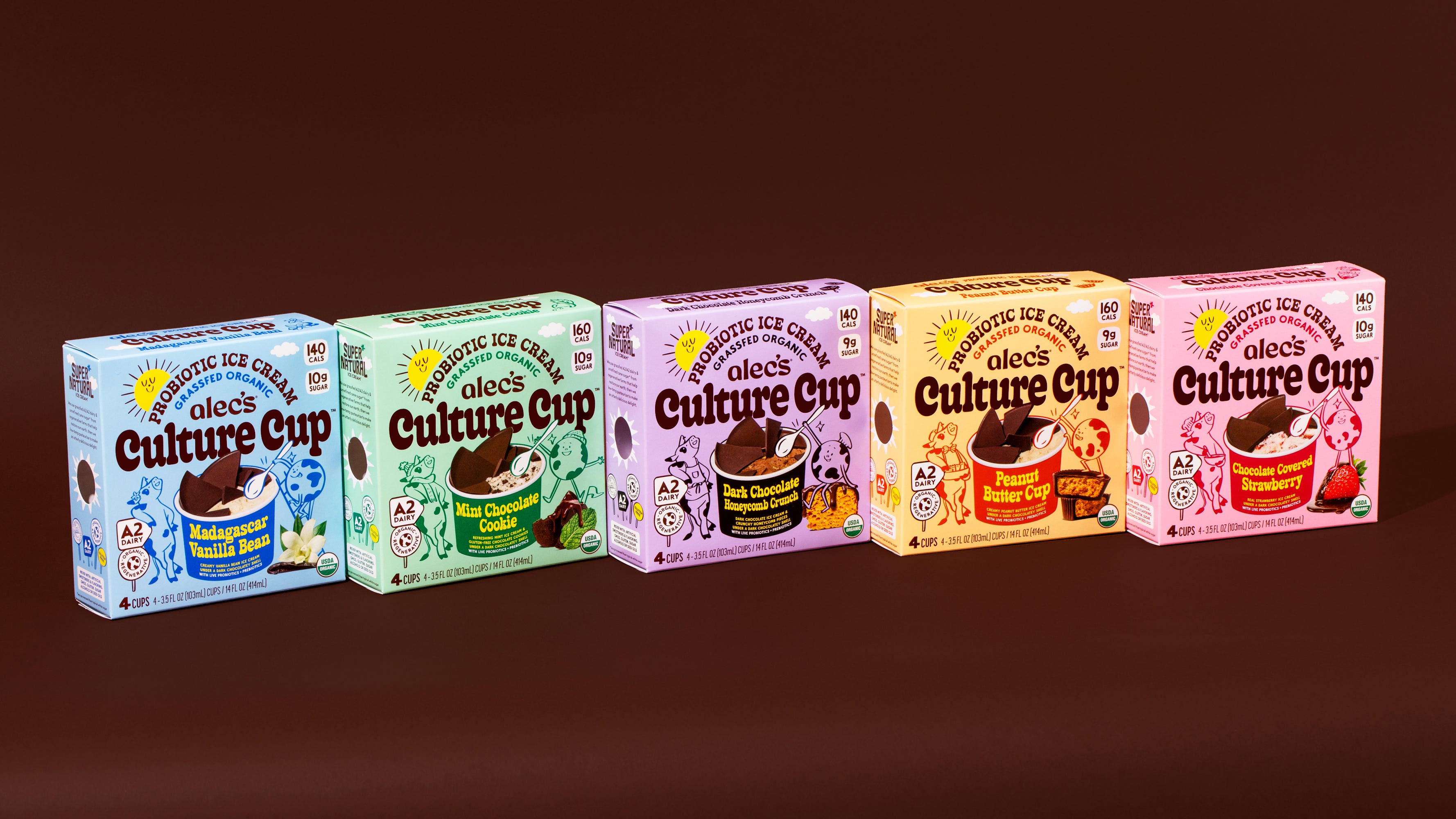 Colorful boxes of probiotic ice cream with graphics.