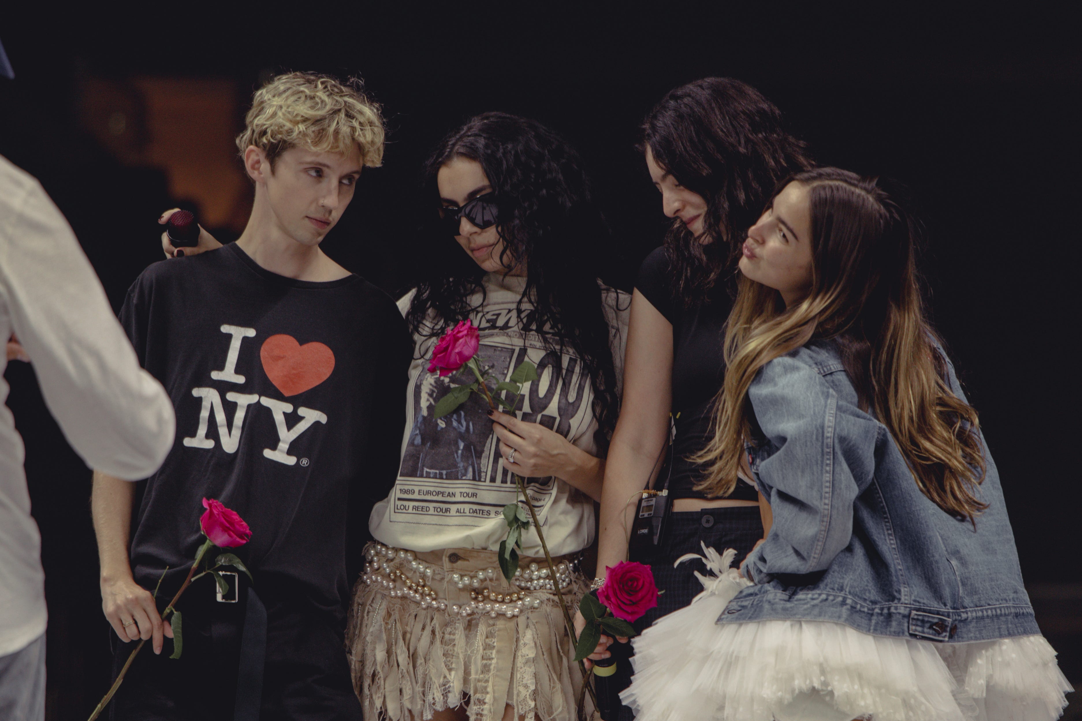 Troye Sivan, Charli XCX, Lorde, and Addison Rae pose backstage at the Sweat Tour.