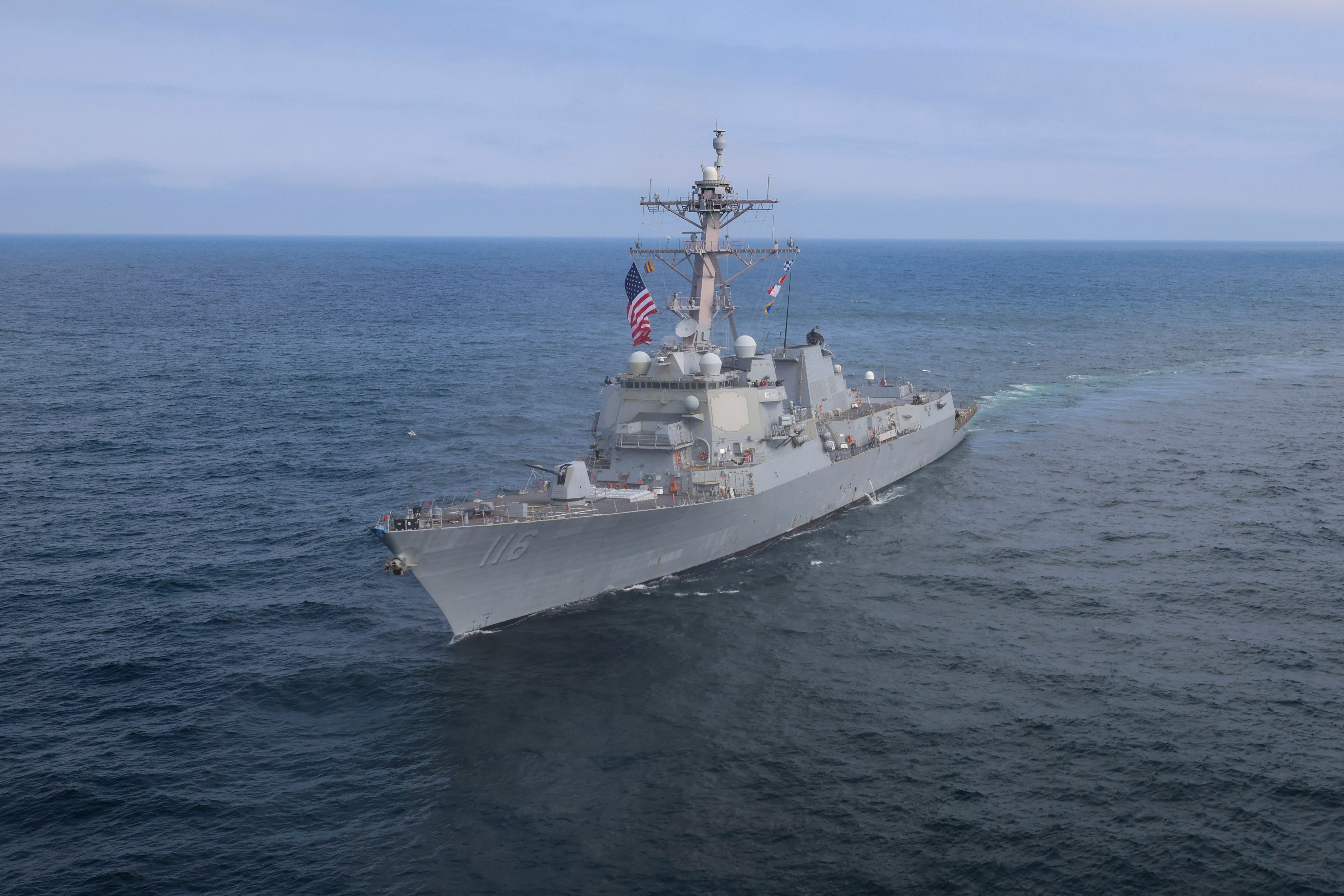 The Arleigh Burke-class guided-missile destroyer USS Thomas Hudner (DDG 116) maneuvers into position during At-Sea Demonstration (ASD) / Formidable Shield (FS) 2025.